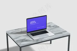 陶瓷桌上的笔记本电脑模型样机