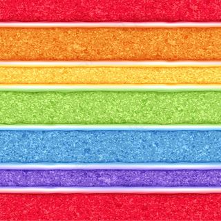 彩虹海绵蛋糕背景。彩色无缝纹理。