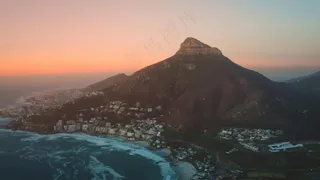 峰峦镇海落日宁静画