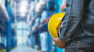 劳动的工人安全帽工作劳动节摄影图