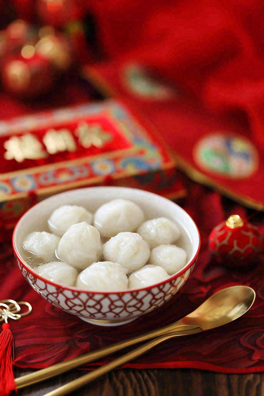 红色节日喜庆背景传统美食汤圆元宵节摄影图