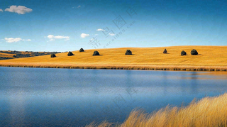 秋天枯黄的草原湖泊大自然风光摄影图
