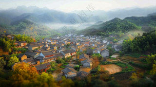 江南风景屋檐瓦舍雾村庄山林摄影图