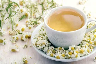 菊花茶白色茶具唯美雏菊下午茶摄影图