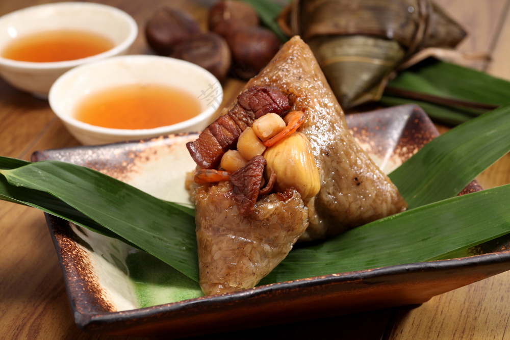 粽子照片图片包粽子粽子摄影裹粽籺粽子摄影端午节茶餐厅粽子