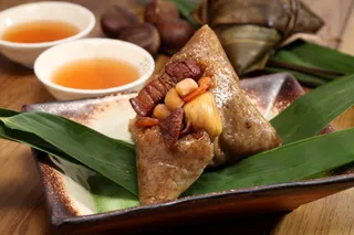 粽子照片图片包粽子粽子摄影裹粽籺粽子摄影端午节茶餐厅粽子