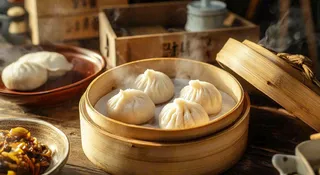 美味的小笼包笼屉美食早点摄影图