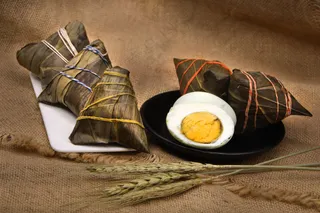 粽子照片图片包粽子粽子摄影裹粽籺粽子摄影端午节茶餐厅粽子