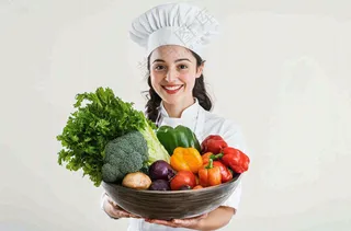 女生厨师抱着蔬菜盆生鲜白色背景摄影图