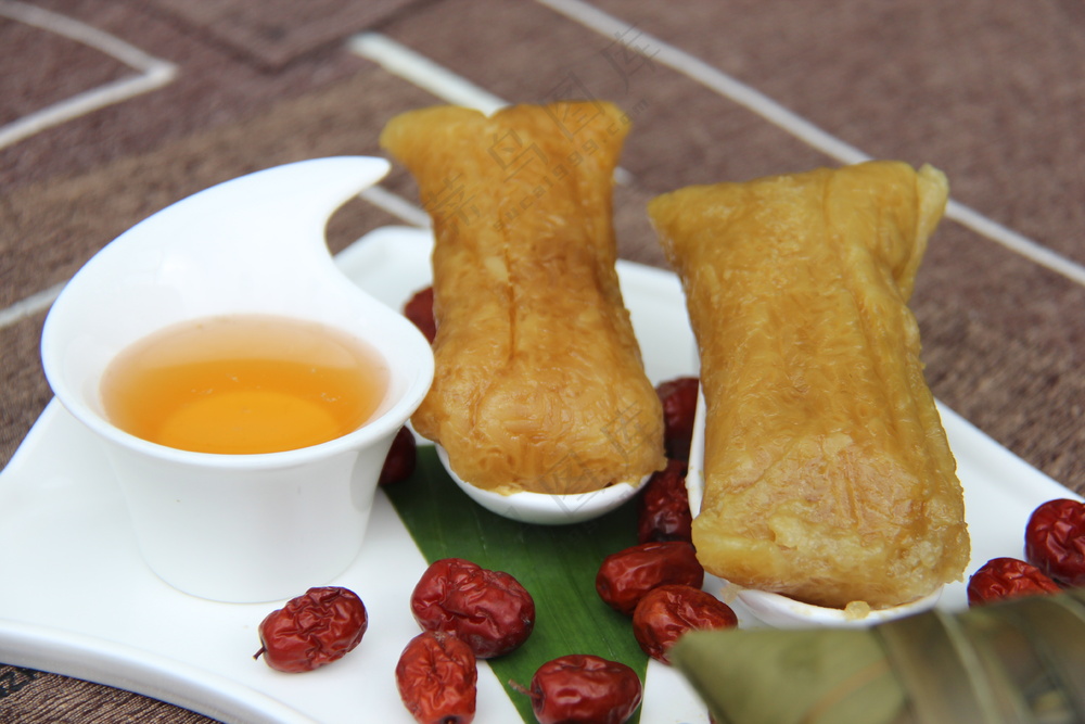 肉粽子图片包粽子粽子摄影裹粽籺粽子摄影端午节茶餐厅粽子