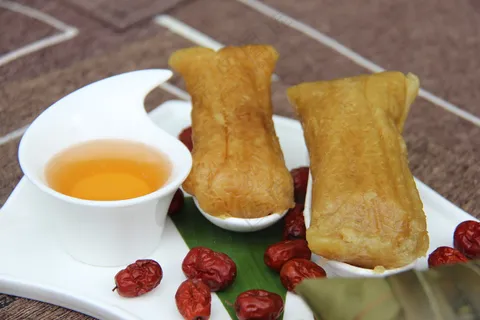 肉粽子图片包粽子粽子摄影裹粽籺粽子摄影端午节茶餐厅粽子