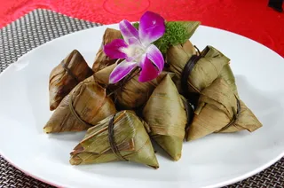 粽子照片图片包粽子粽子摄影裹粽籺粽子摄影端午节茶餐厅粽子