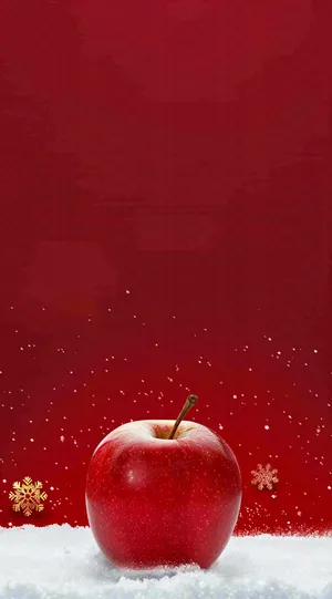 雪地里的红苹果雪花平安夜红色背景