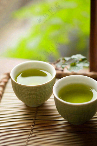 绿茶青花瓷瓷器品茶摄影图