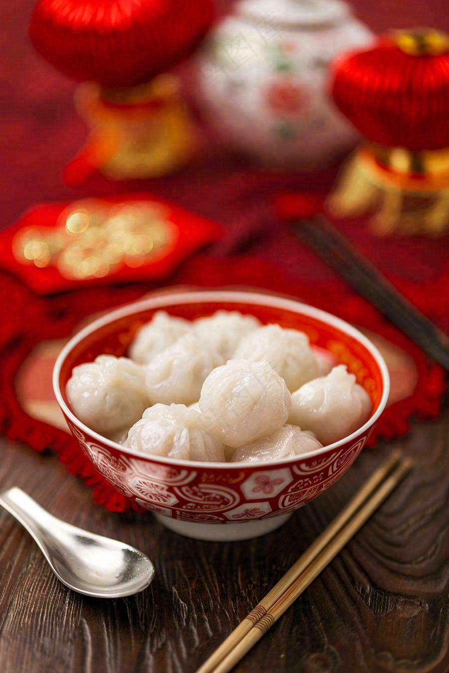 红色节日喜庆背景传统美食汤圆元宵节摄影图