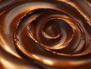 融化的黑巧巧克力美食摄影图