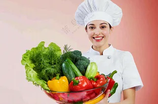 女生厨师抱着蔬菜盆生鲜白色背景摄影图