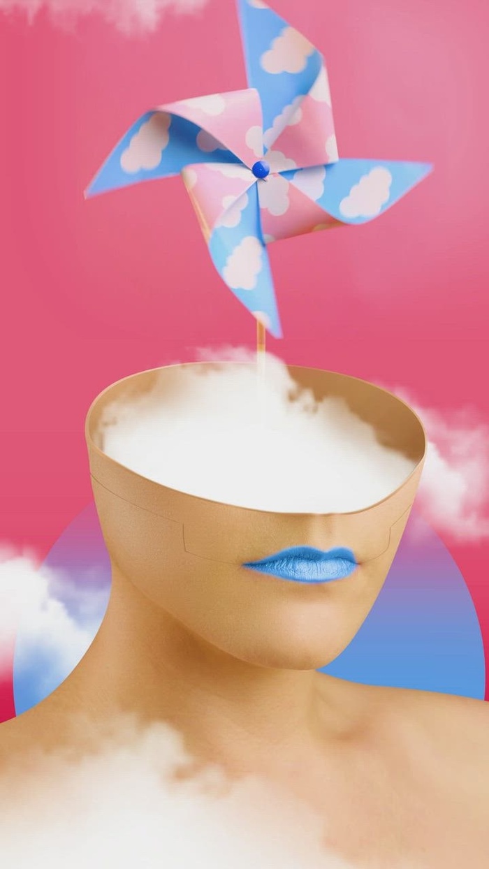 一个女人的头的抽象视频，风车从里面出来