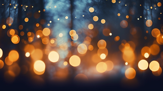 闪光抽象灯彩色的灰尘和光芒豪华散景背景