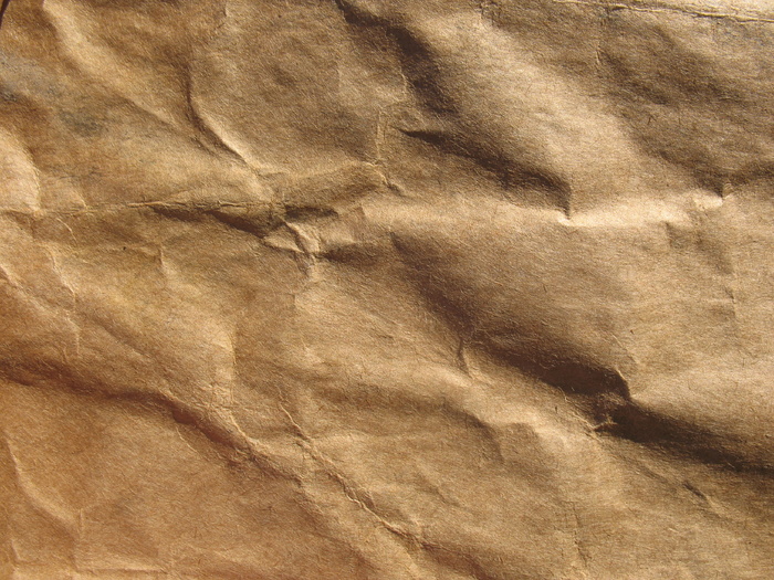 褶皱黄色纸张图片下载