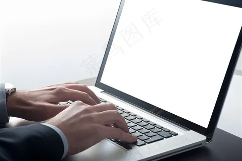 正在操作电脑的商界精英高清摄影图片 正在操作电脑的商界精英高清摄影图片