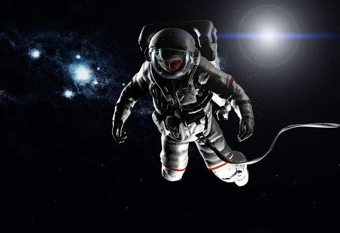 太空宇宙中漂浮的宇航员高清图片