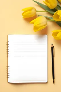 康乃馨黄色纸张笔唯美背景