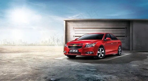 雪佛兰红色汽车顶层平台俯瞰城市广宣图 雪佛兰红色汽车顶层平台俯瞰城市广宣图