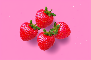 粉红色背景上的个草莓创意背景