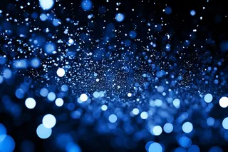 蓝色闪光带有光圈污渍的装饰背景