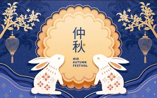 中秋节小白兔月饼蓝色背景