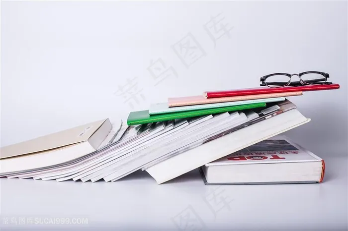 教育眼镜书本创意摆拍