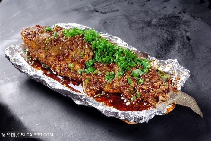 中华美食特色干锅烤鱼摄影图