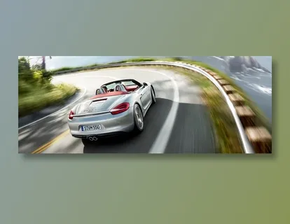 保时捷敞篷跑车快速弯路摄影图