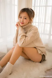 张雨青清纯毛衣室内美女写真图片 张雨青清纯毛衣室内美女写真图片