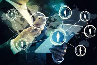 电子科技人物关系图表中拿着电子产品的商务人士高清图片