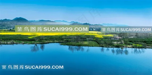 绿草乡村矮房远山摄影图