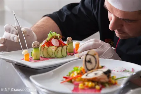 正在精心摆盘的外国大厨高清摄影图片 正在精心摆盘的外国大厨高清摄影图片