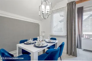 房间的吊灯与桌上餐具陈设摄影高清图片