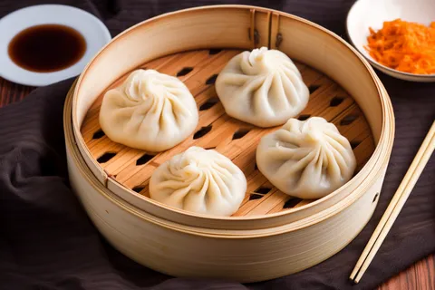灌汤小笼包美食早点摄影图 灌汤小笼包美食早点摄影图