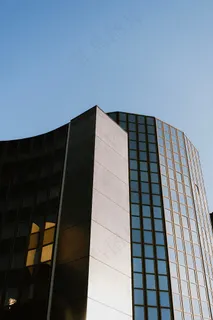 蓝天下的玻璃建筑物图片 蓝天下的玻璃建筑物图片