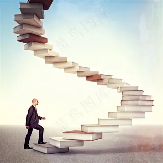 书本旋梯和商务男士图片