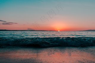 黎明海滩日出图片