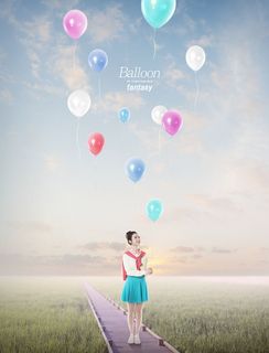 美女气球蓝天背景