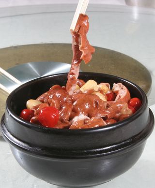 石烹唐肥肠 25 洋葱 石头子