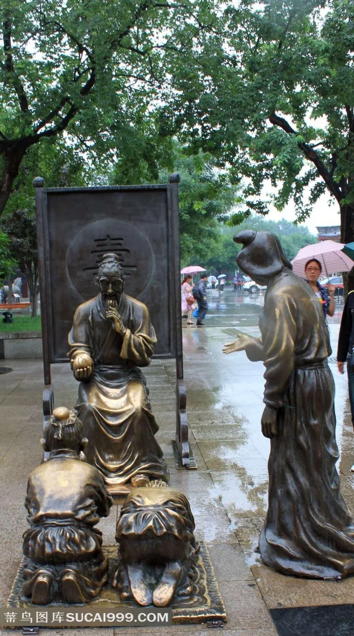古典孩童祝寿雕塑摄影素材