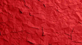 红色褶皱纸张纹理背景