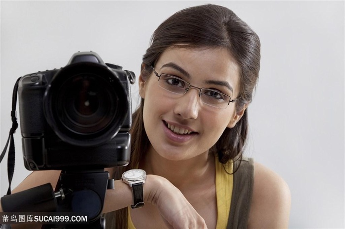 职业人物拿相机女摄影师图片