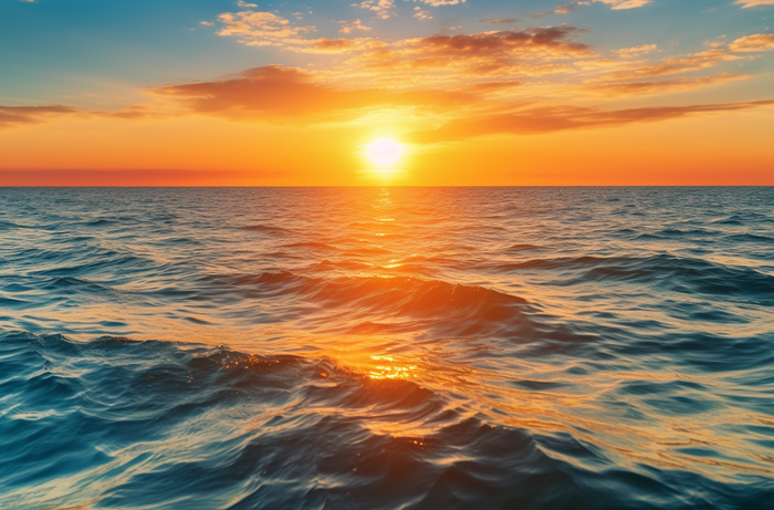 美丽的日落湖泊海洋的地平线上的太阳摄影图