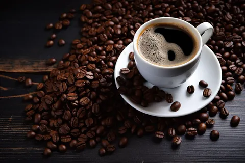 咖啡杯咖啡豆铺满摄影图